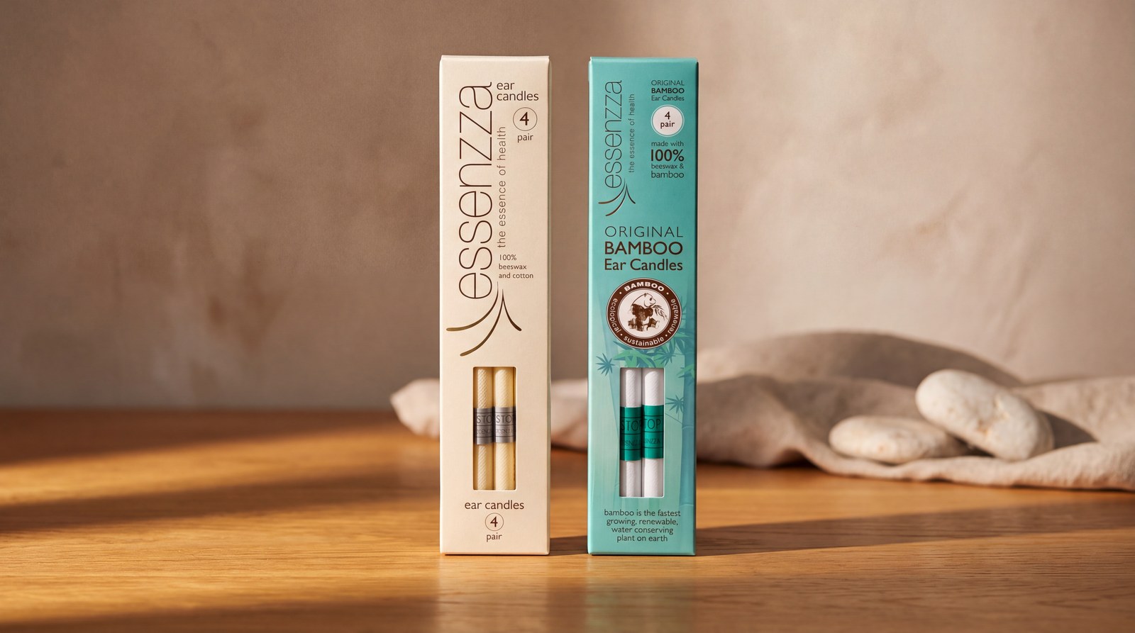 Essenzza Original beeswax and Original Bamboo ear candle packs, showing the difference in material.
